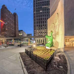 Spirit of Detroit statue illuminated in downtown Detroit at blue hour cityscape